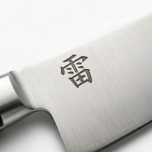 Kaminari 8-inch chef knife blade close-up showing sharp edge