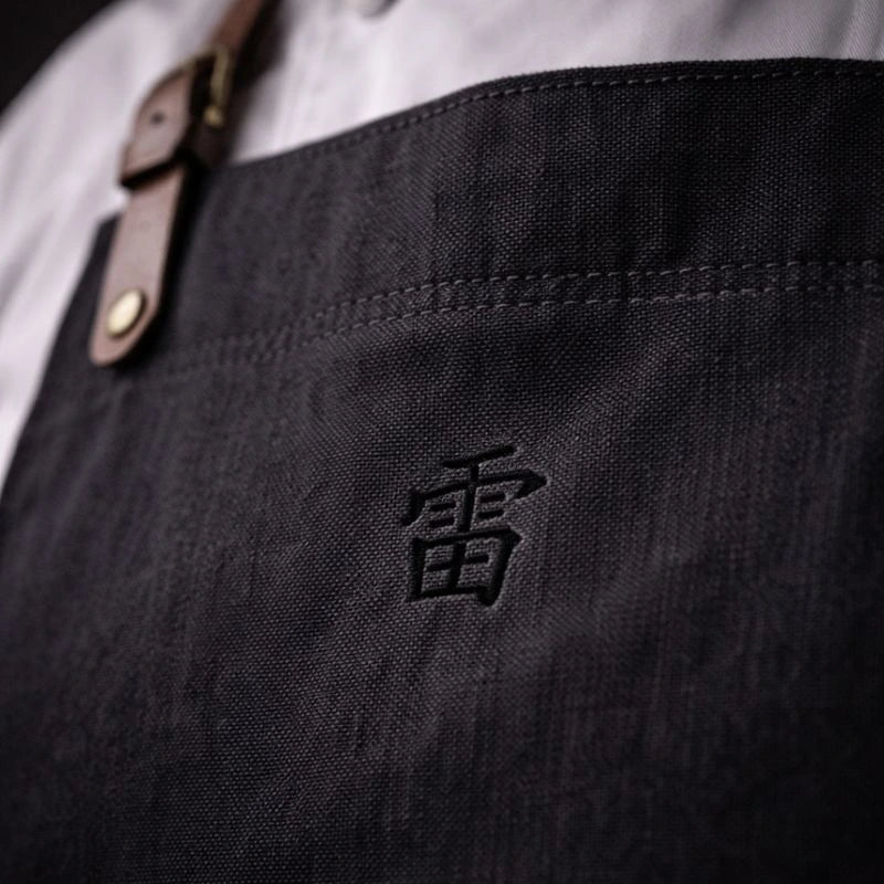 Kaminari chef apron close-up showing durable canvas fabric and reinforced stitching