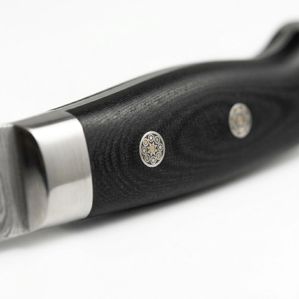 Kaminari Damascus chef knife handle close-up luxury craftsmanship detail